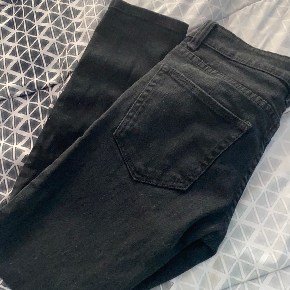 black ripped jeans